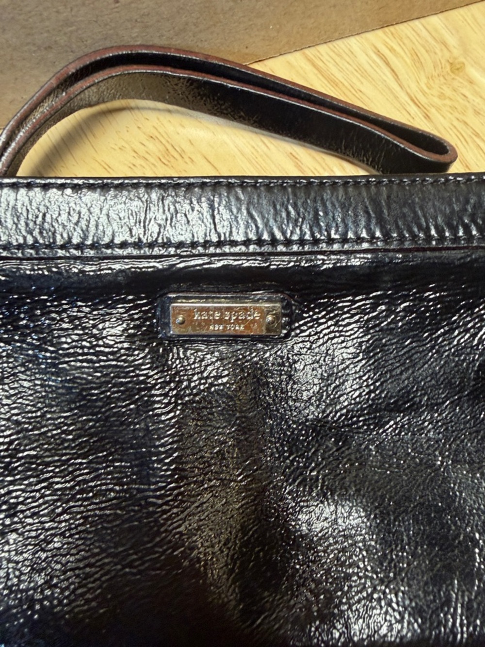 kate spade Black Shiny Leather Wristlet with Logo Plaque